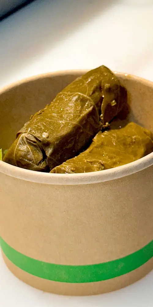 Add on a side order of Grape Leaves on your next visit! They are tangy and vibrant, a perfect pick m
