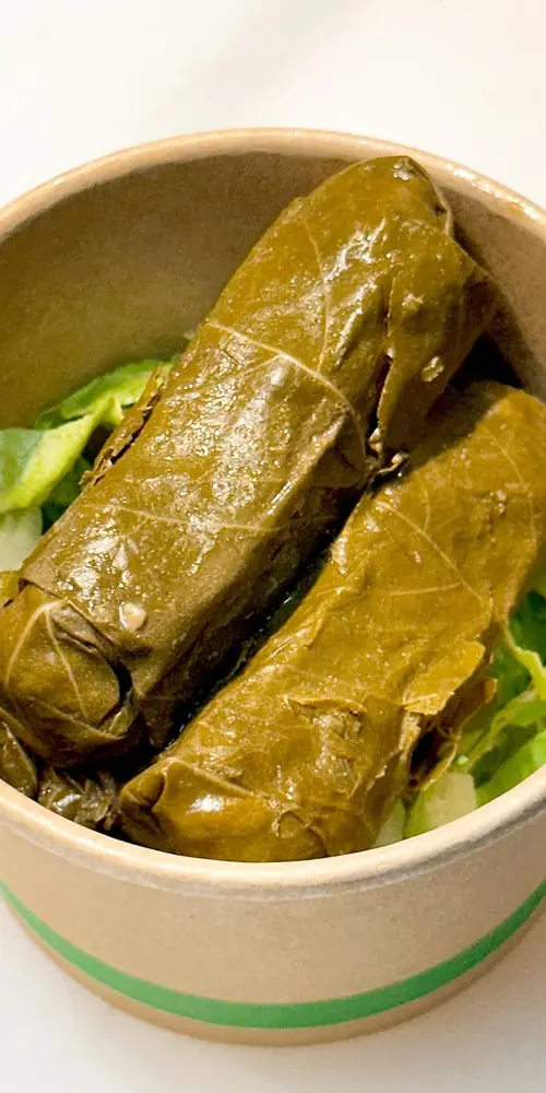 Add on a side order of Grape Leaves on your next visit! They are tangy and vibrant, a perfect pick m