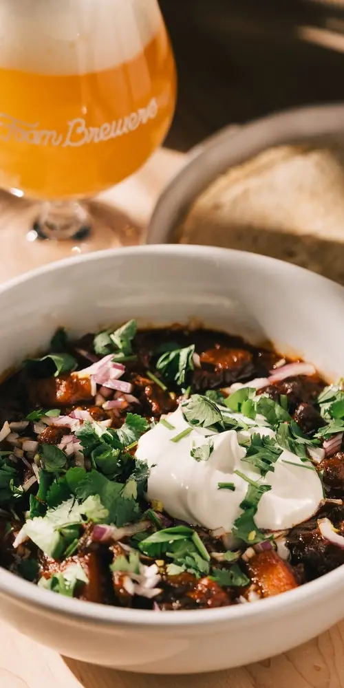 Chili Colorado, A traditional beef stew made with green chilies and potato simmered in a rich, flavo