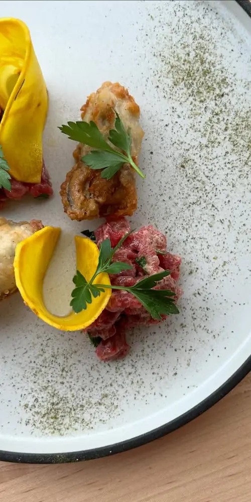 Bread and butter celery root, tartare, oysters.