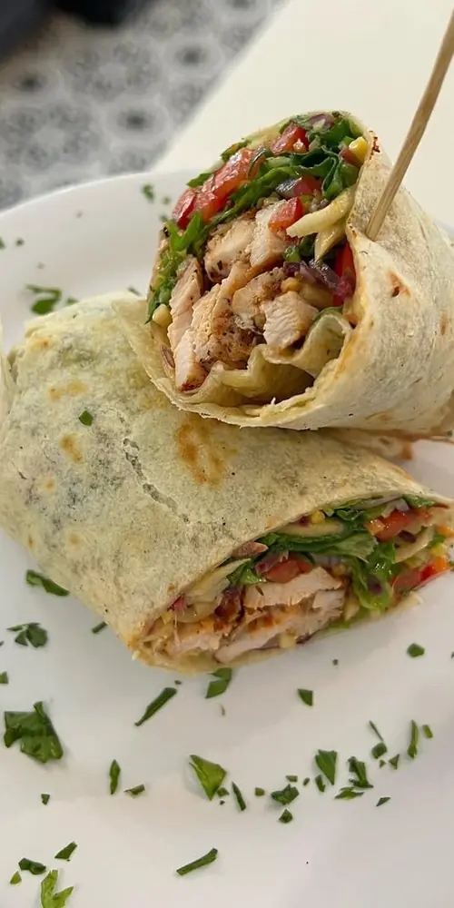 We have a Tuscan chicken salad wrap special with mesclun greens, carrot, red onion, bell pepper and