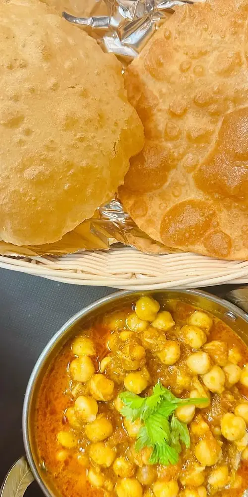 Comfortable ChanaMasala with house made poori. One of my personal Favorite.
