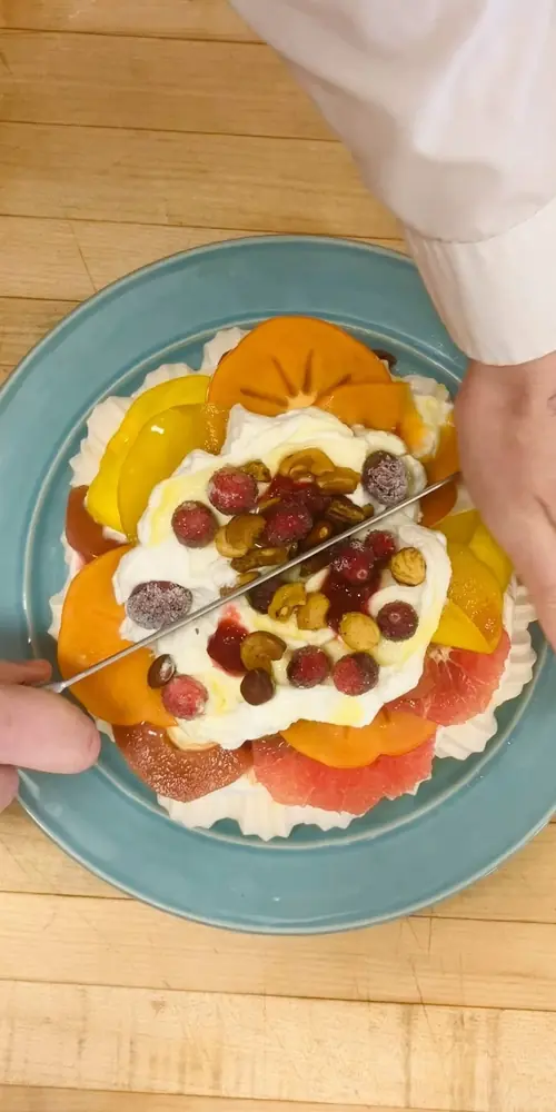 Let’s cut some pavlova (You can find pavlova kits for Thanksgiving in the catering shop off the site