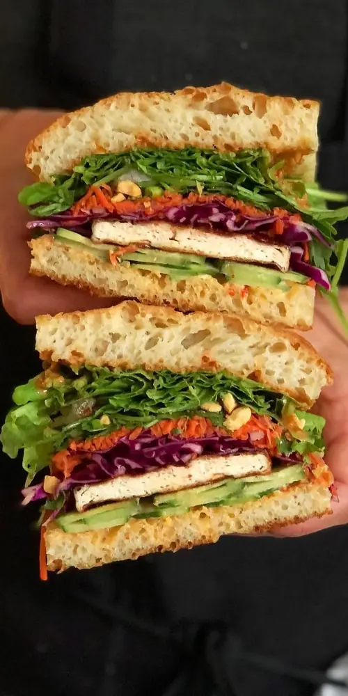 a popular girl has returned… mama t is on the menu! hoisin roasted tofu, peanut sauce, sambal aioli,