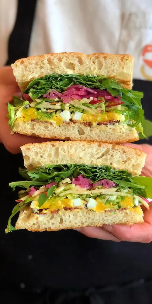 back this week…the cj cr-egg! brussel sprout salad, pickled red onions, egg, bacon, sage aioli, appl