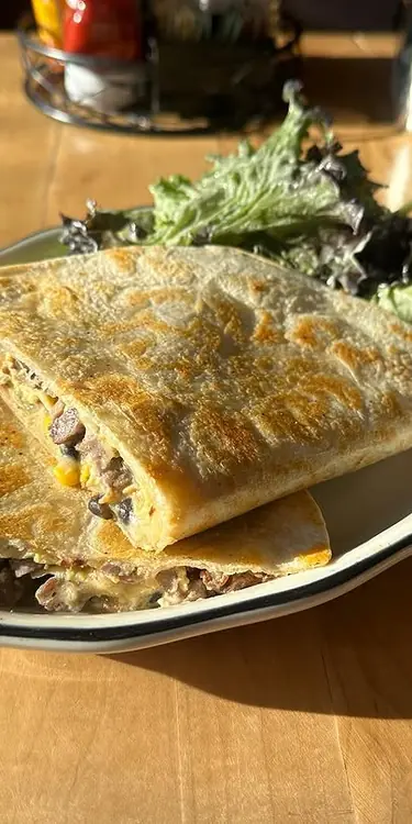 Steak, Black Bean Corn Salsa Verde, and Melted Cheddar Quesadilla with Avocado Ranch Salad Greens @s
