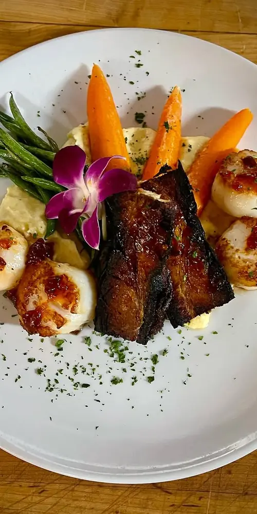 Our special tonight!
Seared Scallops & Slow Roasted Pork Belly-
served with polenta, carrots and gr