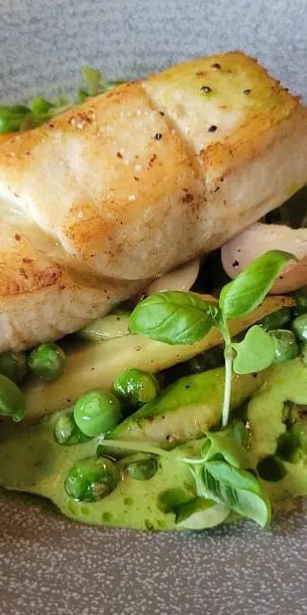 Tonights dinner special: Seared Halibut, english peas, asparagus, and radishes. Its delicious! Stop