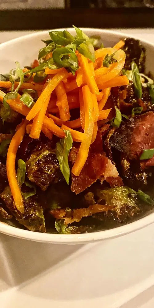 Maple Dijon bourbon glazed Brussels with prosciutto and pickled carrots!
