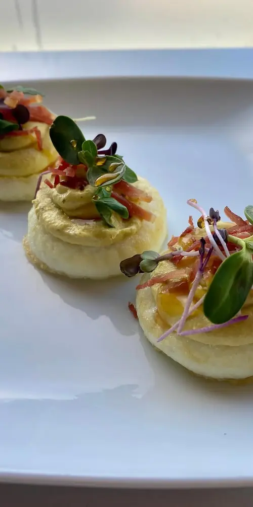 Tarragon deviled eggs with crispy prosciutto, micro greens and hot honey! #rutland#downtownrutlandvt