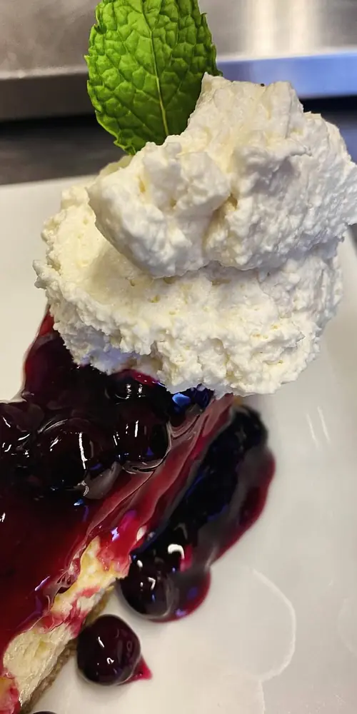 Cheesecake with blueberry sauce and vanilla whipped cream tonight! We also have Orange Blossom creme