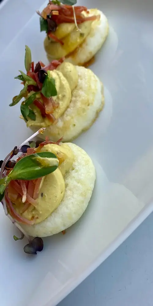 Tarragon deviled eggs with crispy prosciutto, micro greens and hot honey! #rutland#downtownrutlandvt