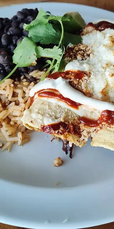 On special at The Mad Taco in Essex, Smoked Brisket Enchiladas with roasted jalapeno crema, cotija,