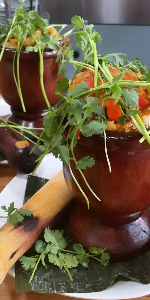 Who needs a plate when your dinner is served in this beautiful pilon...
Our creole shrimp mofongo