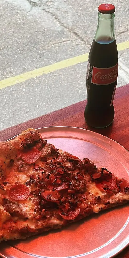 Slice & ice cold Coke! The best way to start the week! Largest slices in the state! #3brospizzavt